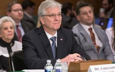 Fed official calls for rate cut amid ongoing pressure from Trump