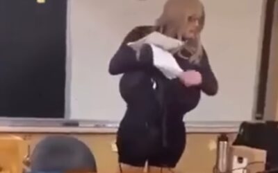 Trans teacher with giant prosthetic breasts placed on leave