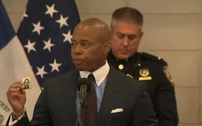NYC Mayor Eric Adams had a fallen cop’s photo printed out so he could pretend he’s been carrying it for years: Report