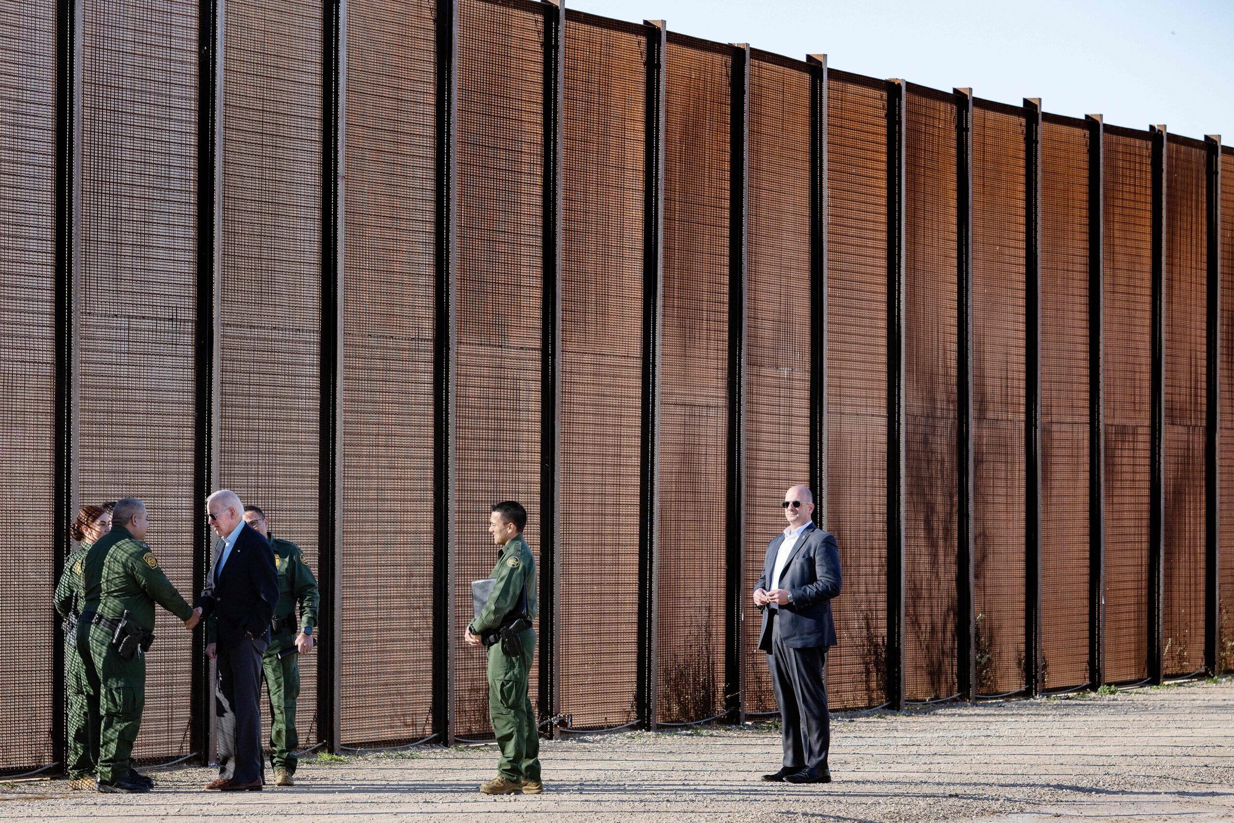 US President Joe Biden speaks with US Customs and Border Protection officers as he visits the US-Mexico border in El Paso, Texas, on January 8, 2023. (Photo by Jim WATSON / AFP) (Photo by JIM WATSON/AFP via Getty Images)