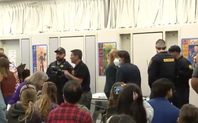 Audience tossed from school board meeting ahead of vote to ban specific flags from being flown on district grounds