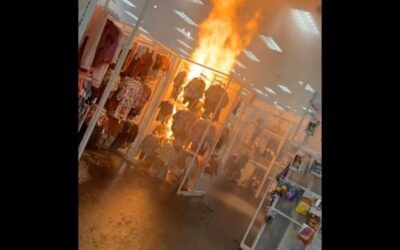 Definition of dumpster fire! Target store kid’s clothing display engulfed in flames