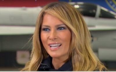 Plane appears over Trump rally targeting Melania