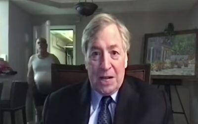 Hilarious moment a man ‘in his underwear’ casually crashes Clinton advisor Dick Morris’ live Newsmax hit