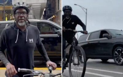 Mayor Brandon promotes ‘Bike to Work Week’ flanked by two hulking suburbans
