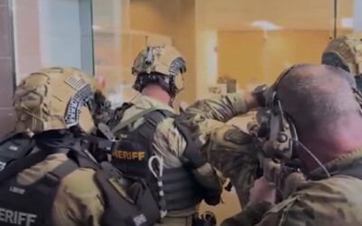 Sniper in Florida fires through computer monitor to take out bank robber holding hostages
