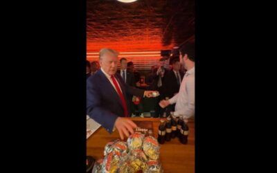‘What a dude!’ Trump passes out burgers and makes casual history in NYC bar