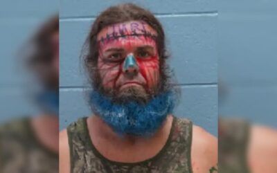 Bearded perp makes it into mugshot Hall of Shame after threatening to bomb beauty store