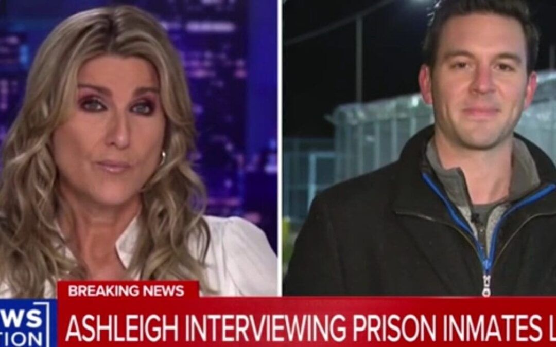 Fellow inmates of alleged CEO killer yell to reporter through prison fence in bizarre live shot