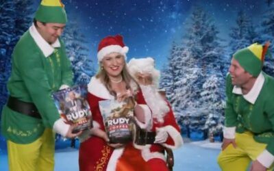 Rudy Giuliani, flanked by two elves, takes on ‘Jolly’ role for coffee ad