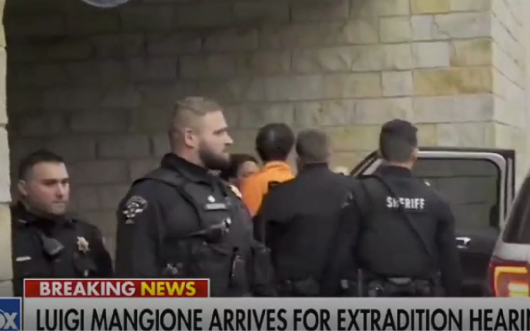‘This is an insult!’: Suspect in UnitedHealthCare CEO murder shouts at reporters as he is led into courthouse
