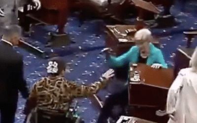 Watch as Elizabeth Warren takes a dramatic tumble on Senate floor