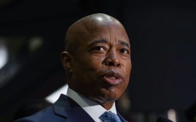 Watch Eric Adams drop profanity, clash with airline passenger