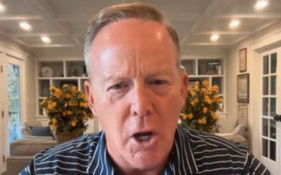 Sean Spicer says it was ‘disgusting and pathetic’ for football fans to boo Trump as he enlisted service members