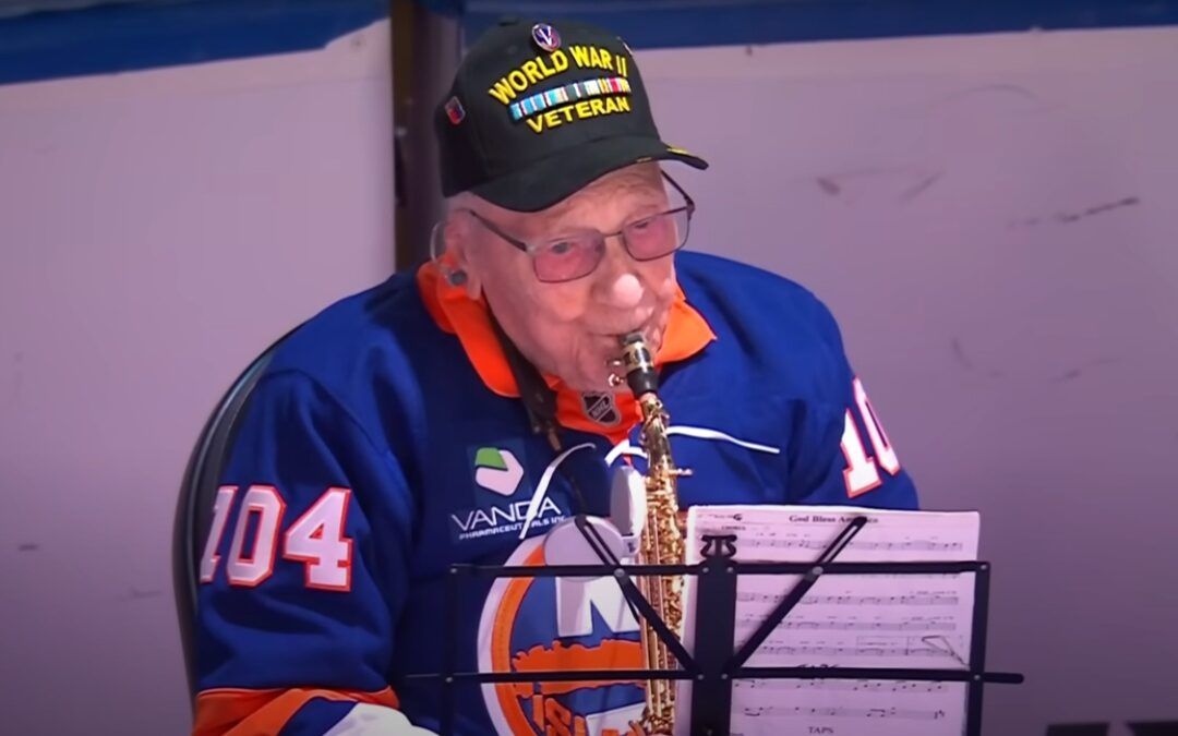 ‘USA! USA!’ Chants erupt as 104-year-old WWII vet plays moving national anthem on center ice