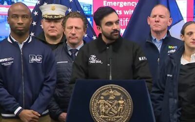 Socialist Mamdani sports customized Carhartt jacket with embroidered message for snowstorm photo ops