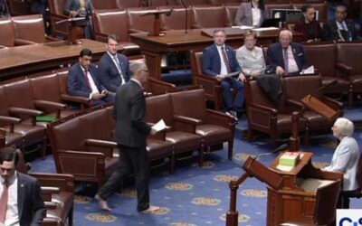 Boomer Dem Congressman Jared Huffman walks around House floor barefoot to honor dead rock star