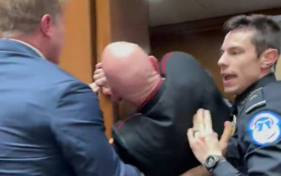 Navy SEAL-turned-senator wrestles shouting left-wing protester who stormed hearing