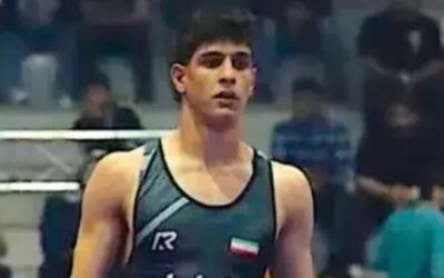 Tehran defies U.S. warning, publicly hangs 19-year-old wrestling champion for dissent