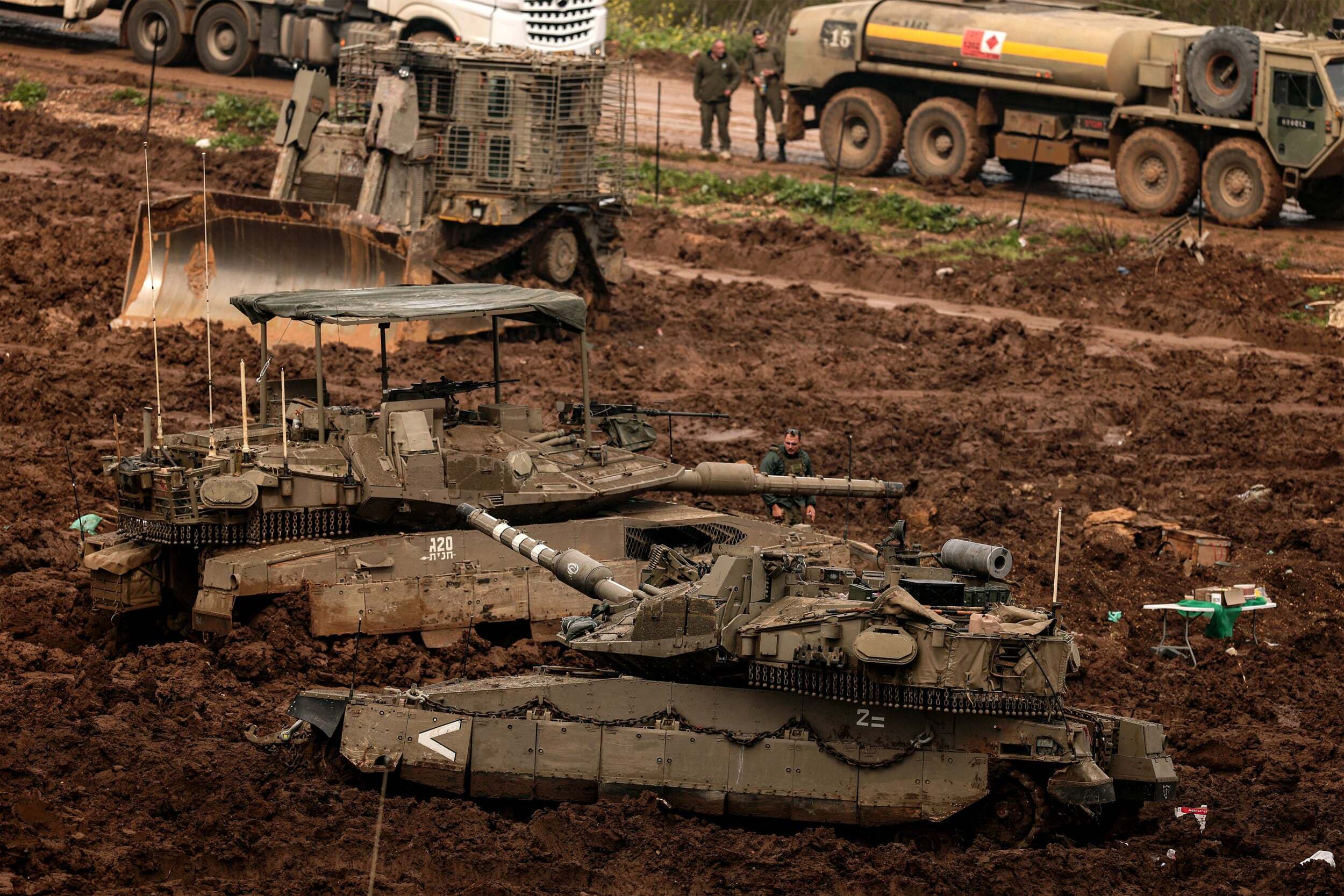 Israeli army Merkava main battle tanks are positioned in the upper Galilee in northern Israel near the border with southern Lebanon on March 26, 2026. (Photo by Jack GUEZ / AFP via Getty Images)