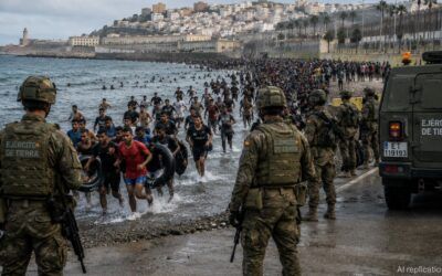 Troops deployed after thousands overwhelm border and 18 migrants die in Spain