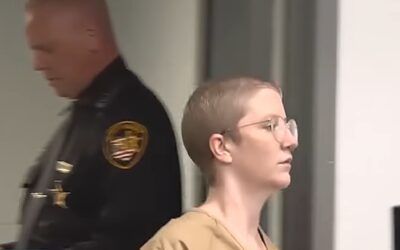 Woman arrested sneaking a sword hidden in a cane to City Hall meeting gets acquitted